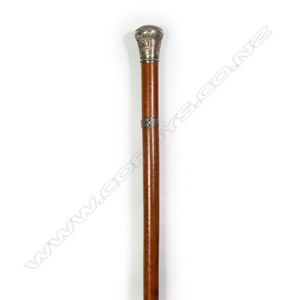 Vintage diamond and spiral carved rounded clear cut glass topped mahogany walking  canes