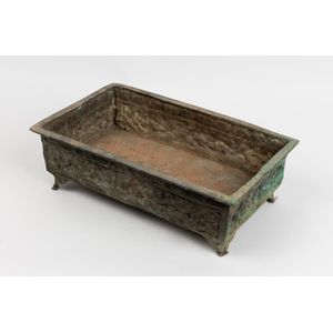 A decorative cast bronze jardiniere, with a running border of…