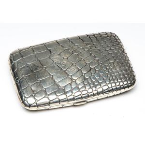 A hallmarked sterling silver card case with crocodile skin…