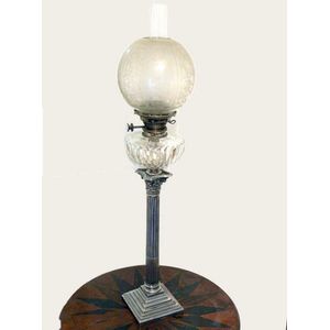 A Walker & Hall plated kerosene lamp with a Corinthian column,…
