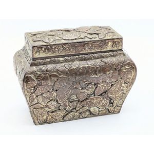 Vintage tea caddy, cast metal decorated with multiple…