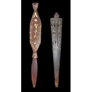Two old lime spatula's, one from the Tufi area, the other…