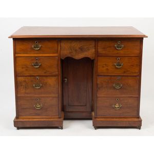 An antique English mahogany knee-hole desk with inverted break… - Desks ...