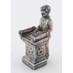 Judaica sterling silver statue of a boy reading the torah, 20th…