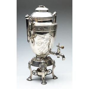 A silver plated samovar with etched body work featuring…