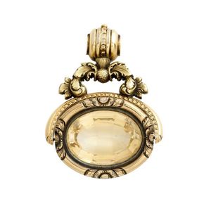 Citrine spinner fob, centring a collet-set oval citrine,&hellip;