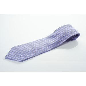 A silk tie by Hermes, styled with monkey faces on lavender&hellip;