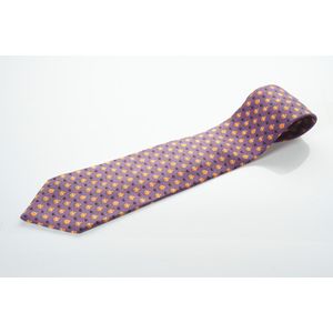 A silk tie by Hermes, styled with orange hippopotamuses on a&hellip;