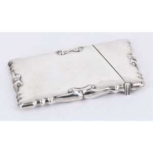 An Edward VII sterling silver card case, scalloped rim, plain…