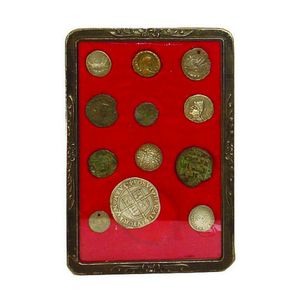 A framed display of twelve antiquarian coins including early…
