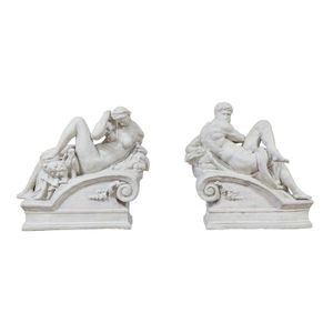 A pair of cast iron figures of night and day, after…