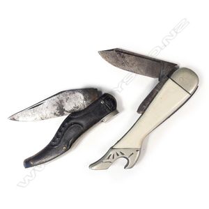 Two vintage novelty pocketknives, one as a woman's leg the…