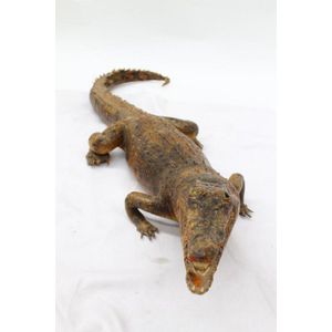 A stuffed crocodile, poised to strike with open jaw, Sepik…