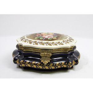 A Sevres style floral and gilt decorated ormolu banded lidded…