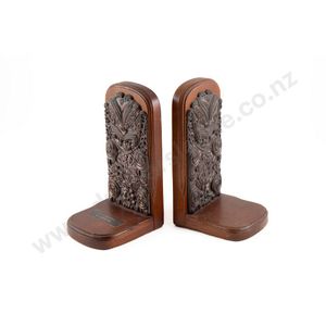 Pair of bookends applied with ornate copper tiki figures,…