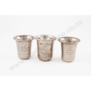 Three circa 1920s sterling silver kiddush cups with engraved…