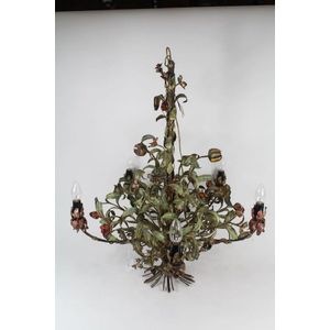 Five branch metal chandelier decorated with leaves and flowers