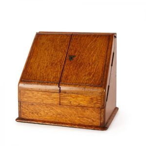 A Victorian slope fronted desk Companion, 1890, with calendar,…