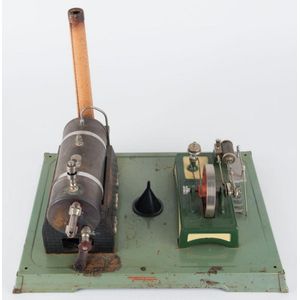 A 1960s Fleischmann composite steam toy comprising brass boiler…