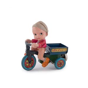 Celluloid delivery boy on tin-plate lithographed wind-up…