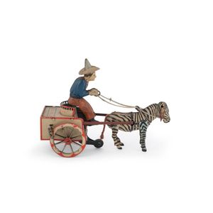 German lithographed tin toy 'Na-Nu' by Lehmann pulling a…