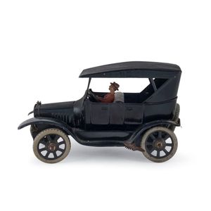 Tinplate wind-up Ford Model-T sedan with driver by Bing,…