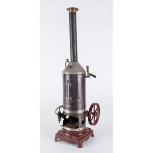 A 1920s Bing steam engine with burnished brass vertical boiler…