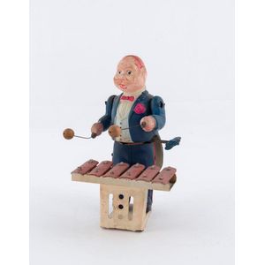 Celluloid and metal windup Xylophone player by modern toys,…