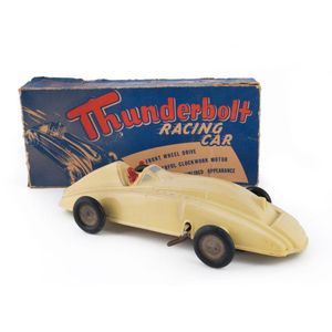 'Thunderbolt Racing Car' wind-up toy made from cream-coloured…
