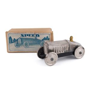 All silver 'Speed' racer with driver; friction powered in…