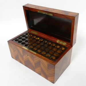 A French cigar box, in kingwood veneers, the interior fitted to…