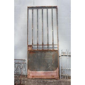 Large antique French wrought iron door, with panelled lower…