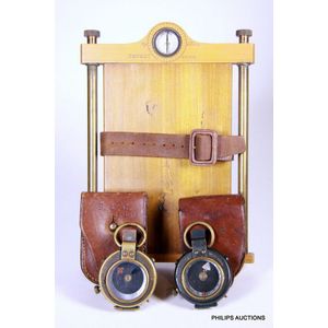 Two Edwardian Short & Mason compasses and a compass board,…