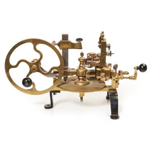 A Swiss watchmakers wheel cutting engine with associated…