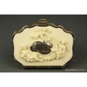 A fine ivory and silver communion purse, late 19th century, the…