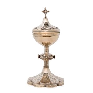 A large French silver ciborium, 19th century. Inscribed to the…
