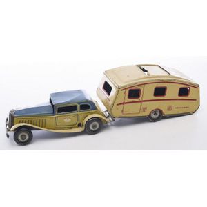 A Mettoy tinplate clockwork Sedan in blue and yellow, with…