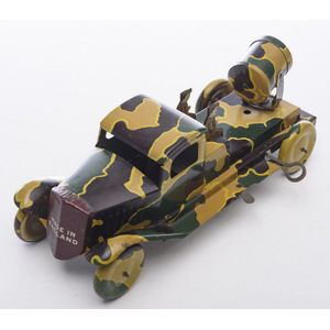 A Mettoy tinplate clockwork army truck with Searchlight, driver…