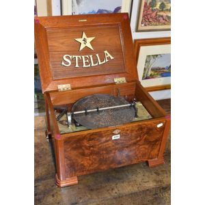 19th century Stella burr walnut musical box with records