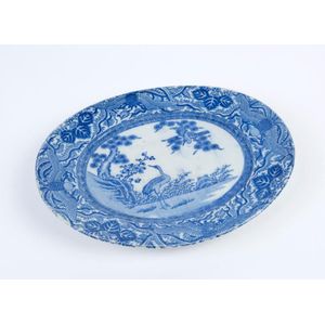 A Japanese blue and white porcelain oval dish with crane…