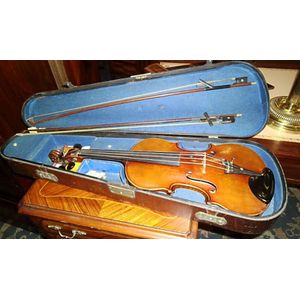 A violin in case together with two bows. Maker Nicola Lupot of…