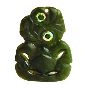 A 20th century Maori greenstone hei tiki, classical form with…