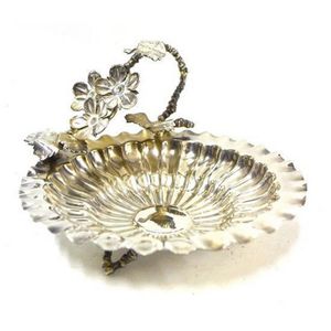 A silver plated berry bowl with flower handle, William Marples…