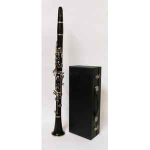 A Tribert French made clarinet, in case, with Selmer mouthpiece…