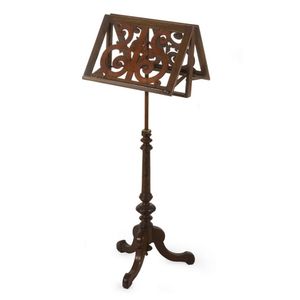 Double music stand, circa 1900s, the fretwork stand supported…