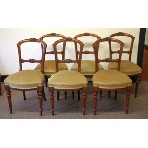 Six Edwardian walnut dining chairs