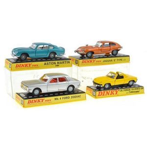 Four Dinky models, including no. 153 Aston Martin DB6 in…