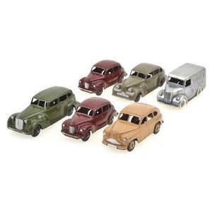 A collection of six unboxed Dinky car models, including two…