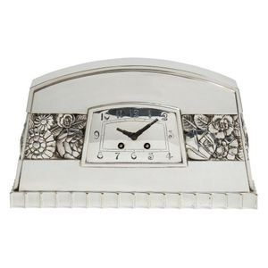 A French Art Deco silvered metal mantel clock, the movement by&hellip;
