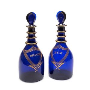 A fine pair of Georgian Bristol blue glass triple ring…
